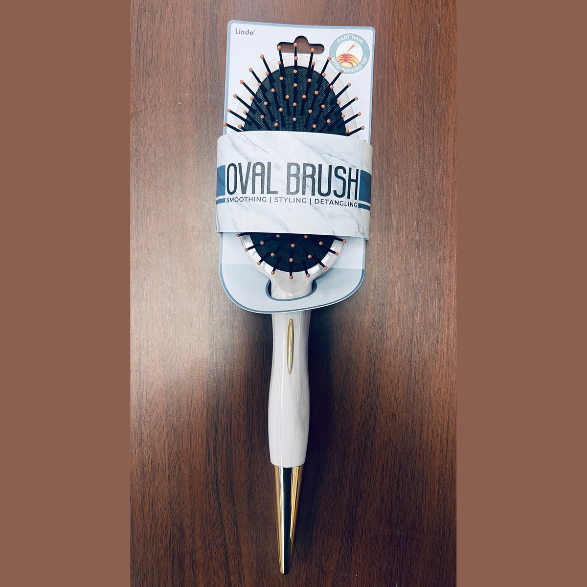 Lindo-oval brush with pointed tip
