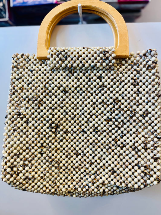 NAYAK-designed Beaded-handbags collections